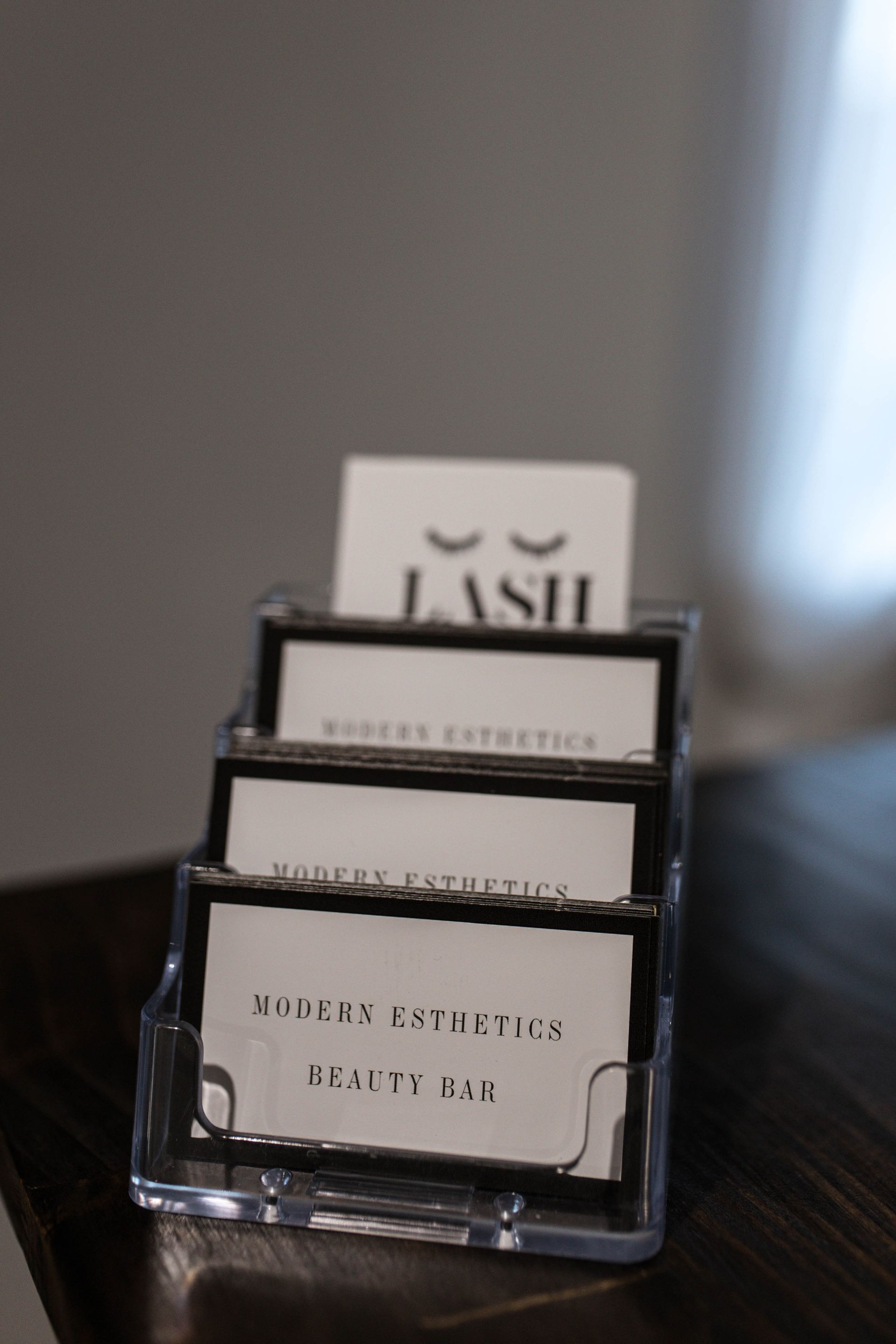 A stack of business cards sitting on top of a table.