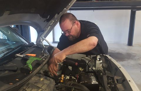 Auto Repair — Mechanic With Diagnostic Device in Goldsboro, NC