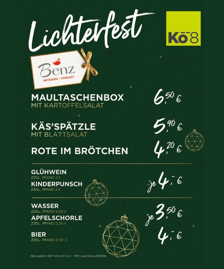 Menütafel für ein Lichterfest mit Essens- und Getränkepreisen in deutscher Sprache auf dunkelgrünem Hintergrund.