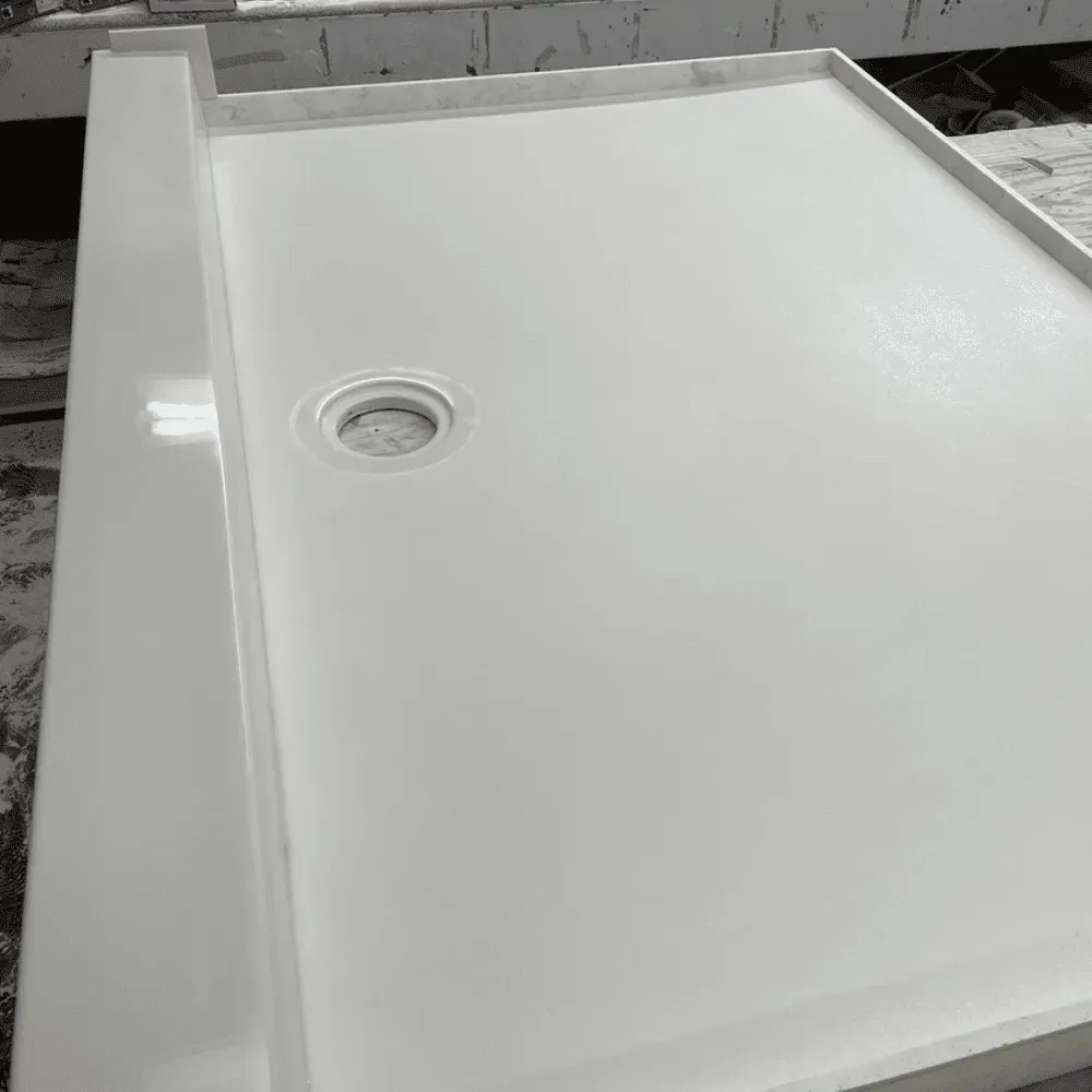 Solid biscuit shower base at Syn-Mar