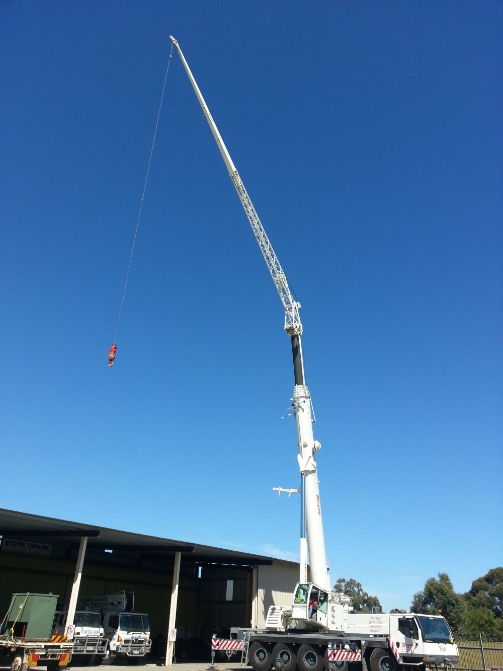 Morgans Cranes 95T Liebherr All Terrain Crane lifting Air Conditioning Unit Crane Hire Adelaide