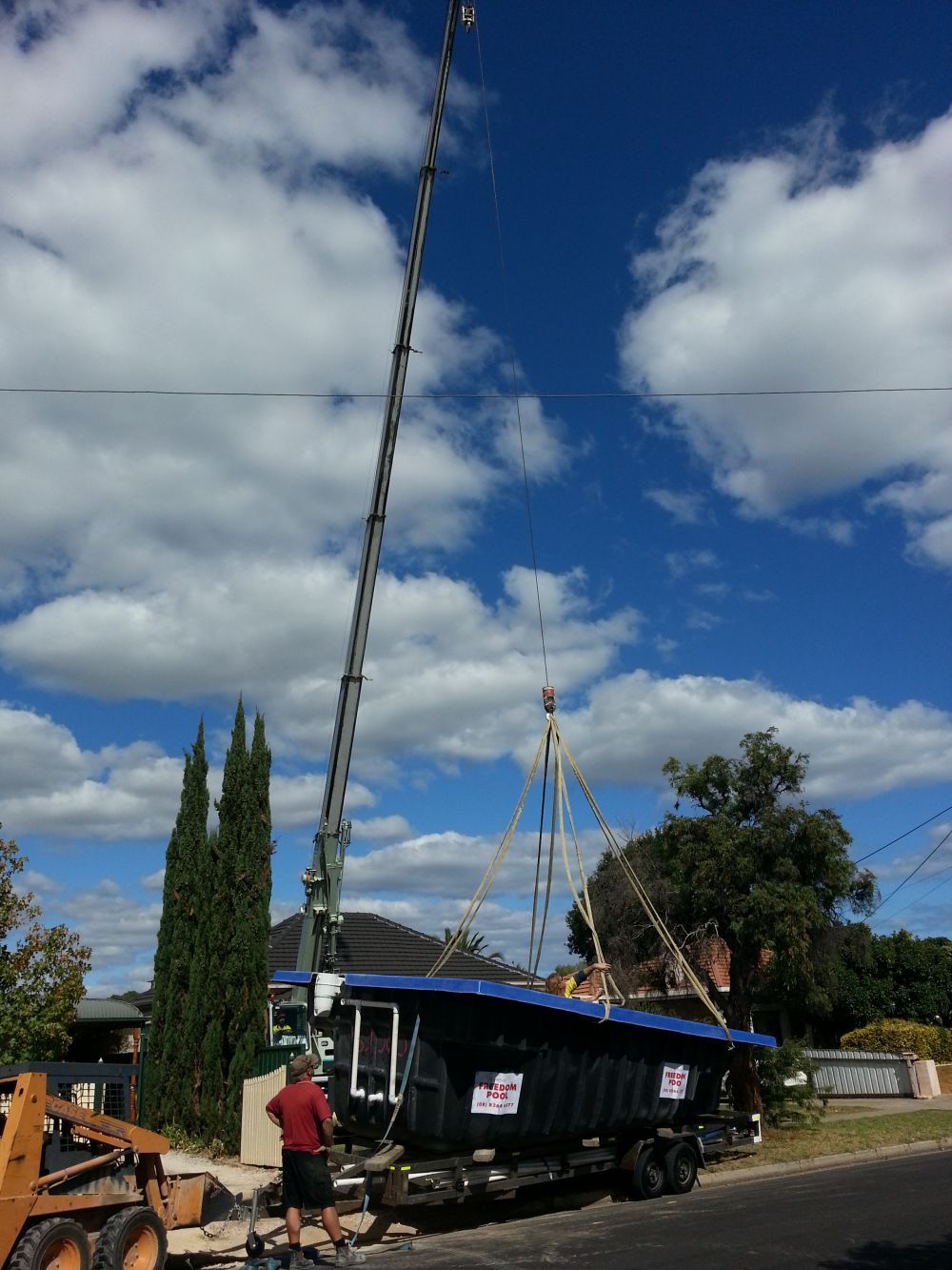 13T Kato crane lifting swimming pool Morgans Crane Hire Adelaide