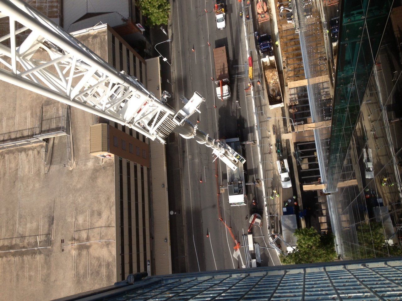 Morgans Crane Hire Adelaide view from the dog box. 95T Liebherr All Terrain Crane on a city high rise project.