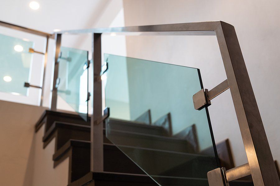 stairs with glass and stainless handrails