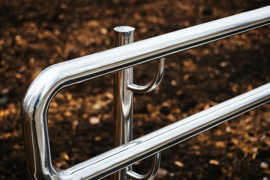 an edge of the stainless steel handrail