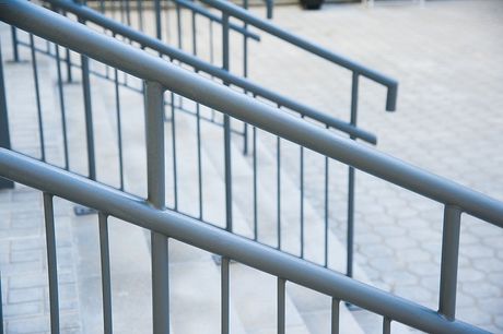 outdoor stair with galvanized handrails
