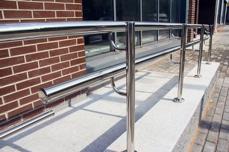 a long  outdoor stainless handrail