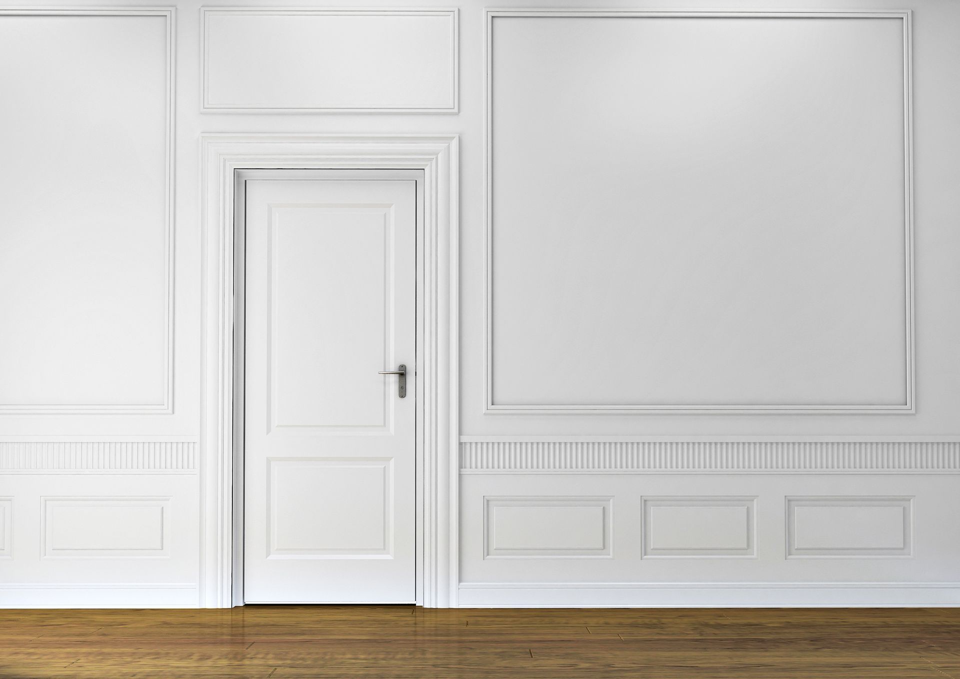 an empty room with white walls and wooden floors and a white door .