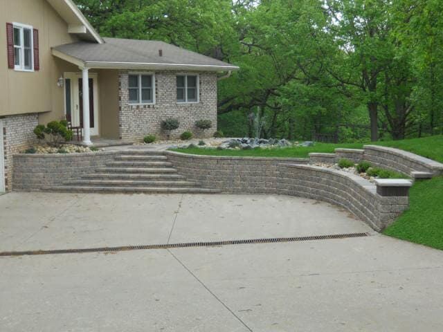 A House With a Concrete Driveway - Orion, IL - C & J Landscaping
