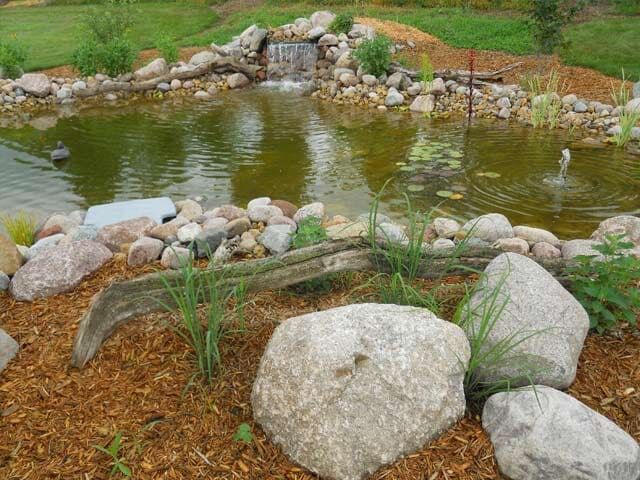 Water fall with pond-Rock Island, IL- C & J Landscaping
