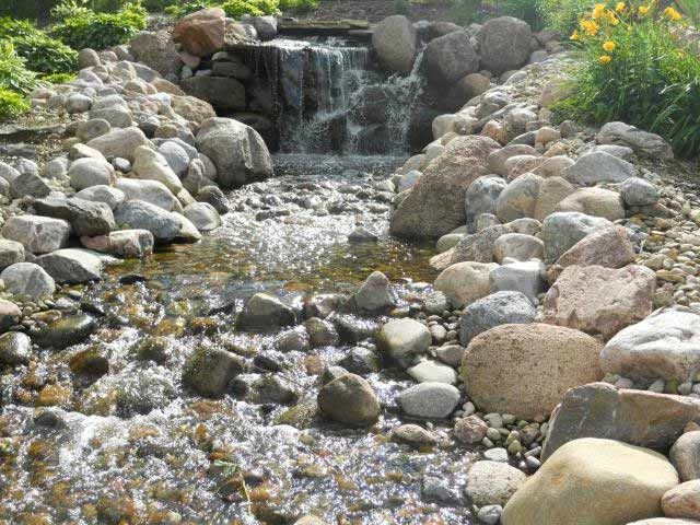 Water fall with stream- Orion, IL- C & J Landscaping