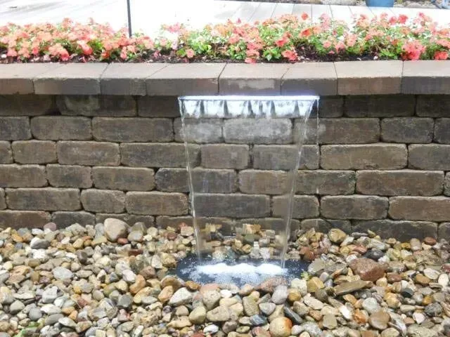 Sheet of water - Rock Island, IL- C & J Landscaping