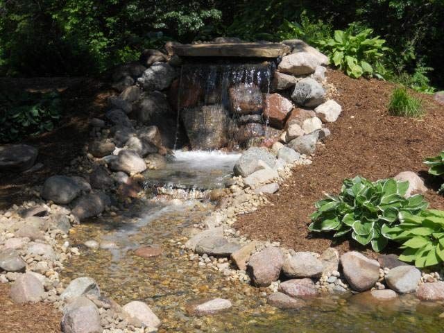 Water fall with stream- Rock Island, IL- C & J Landscaping