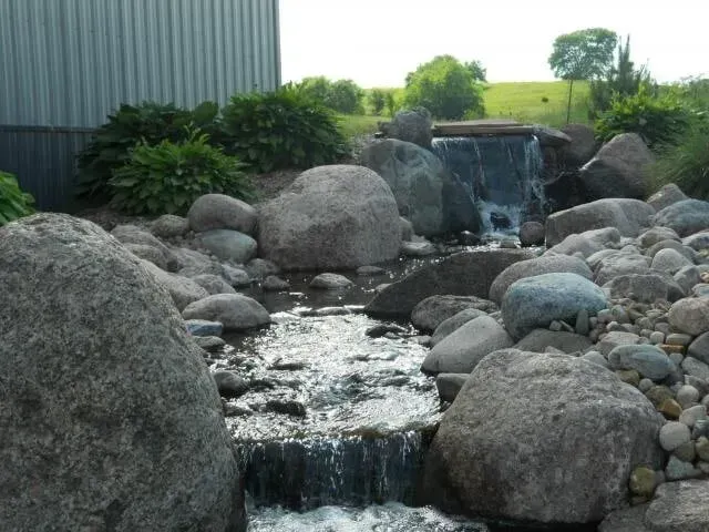 Water fall with stream- Orion, IL- C & J Landscaping