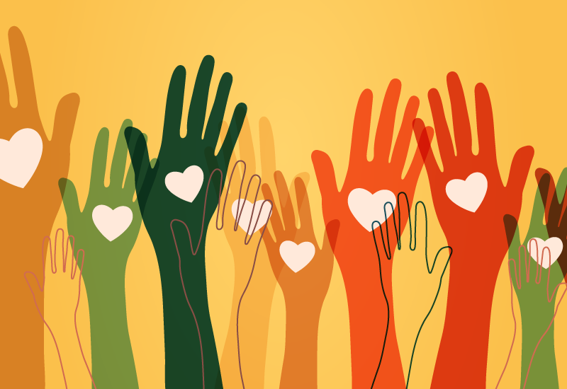 Hands of various colors with white hearts raised against a yellow background.