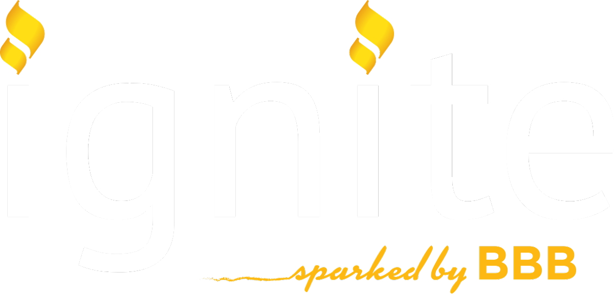 Two gold flame-like symbols, one in each top corner, on a white background.