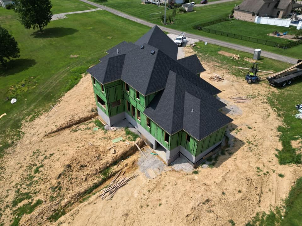 An aerial view of a house that is being built