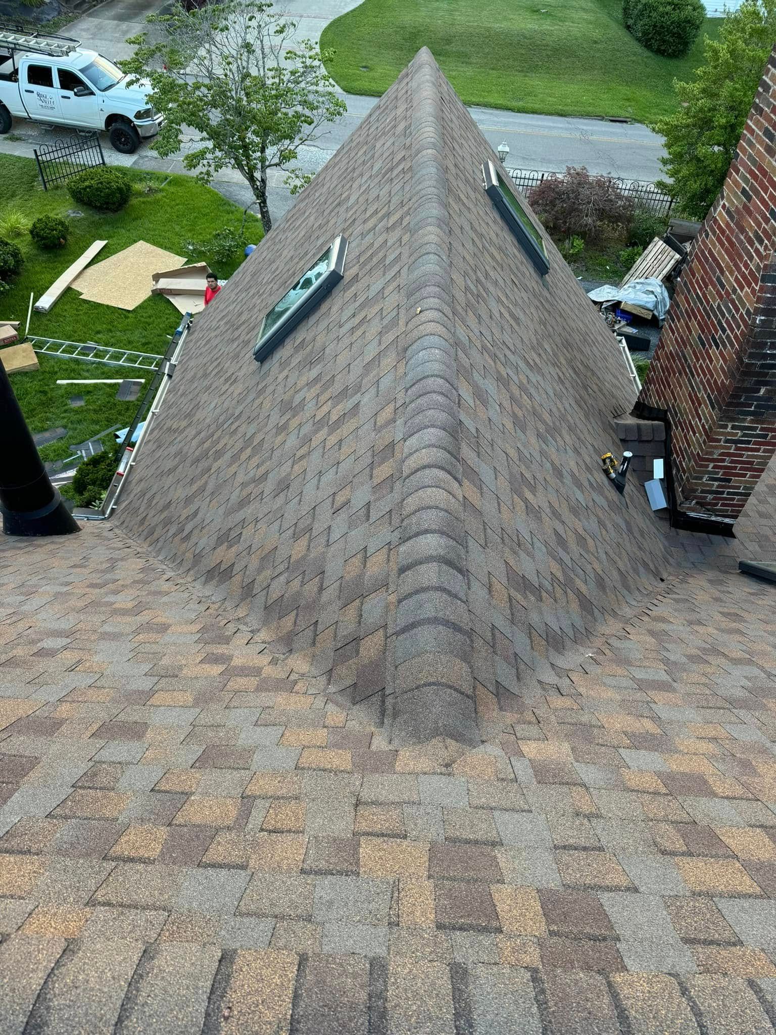 An aerial view of a roof with a pyramid shaped roof.