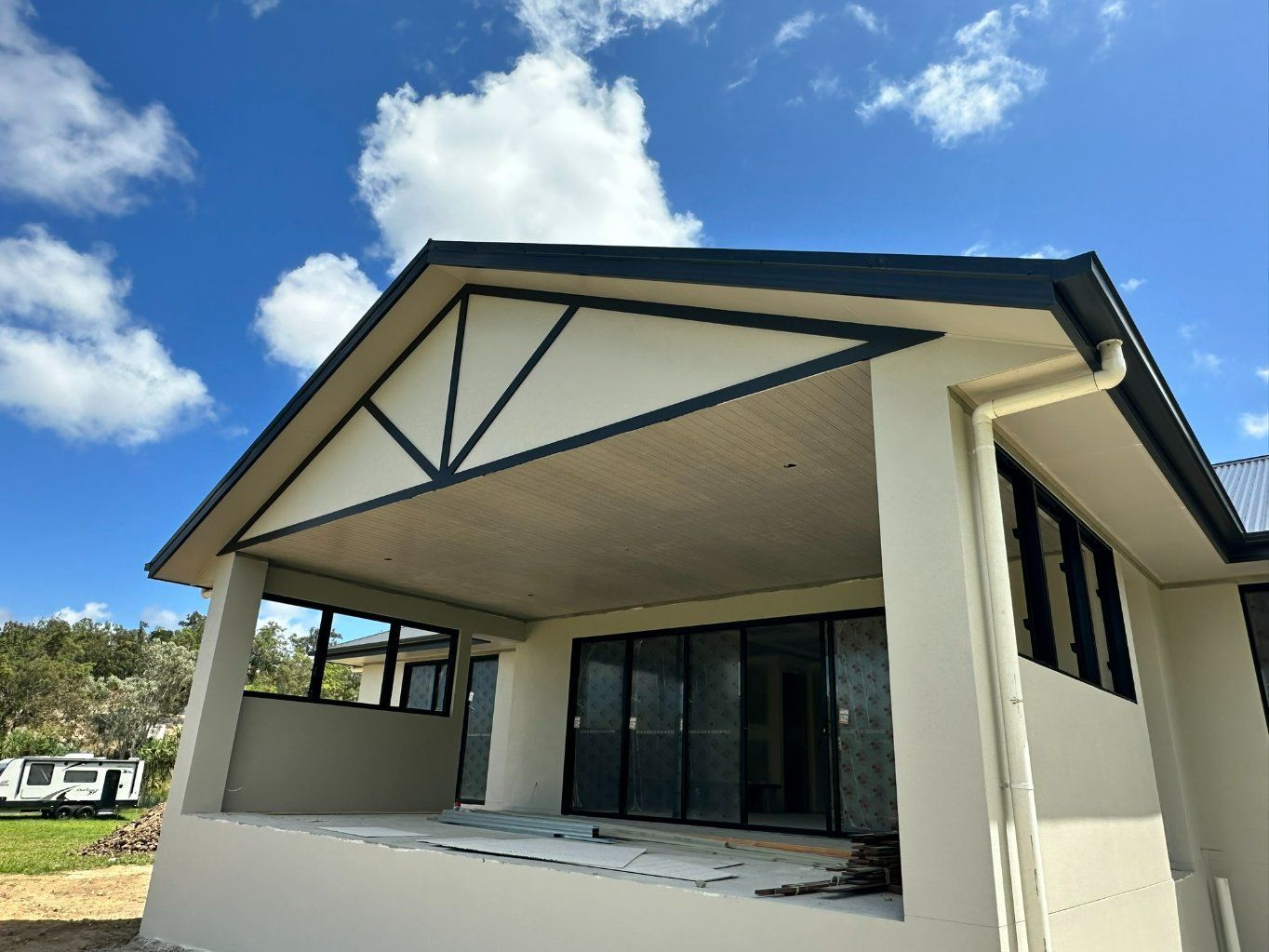 A House With a Porch and a Blue Sky — Hams Plastering in Cannonvale, QLD