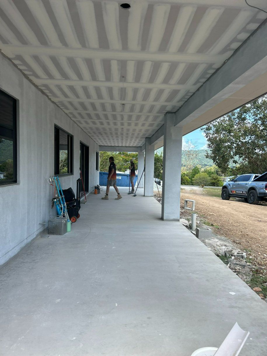 A Covered Porch With a Ceiling That is Being Built on a House — Hams Plastering in Cannonvale, QLD
