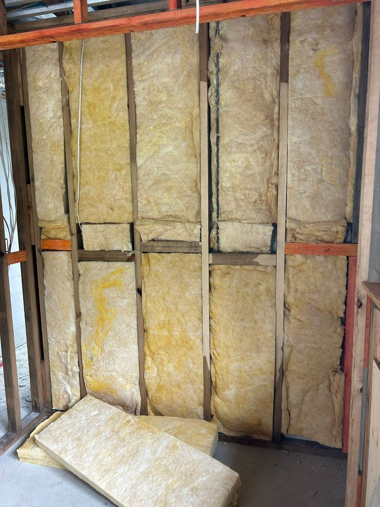 A Room With a Lot of Insulation on the Walls — Hams Plastering in Cannonvale, QLD