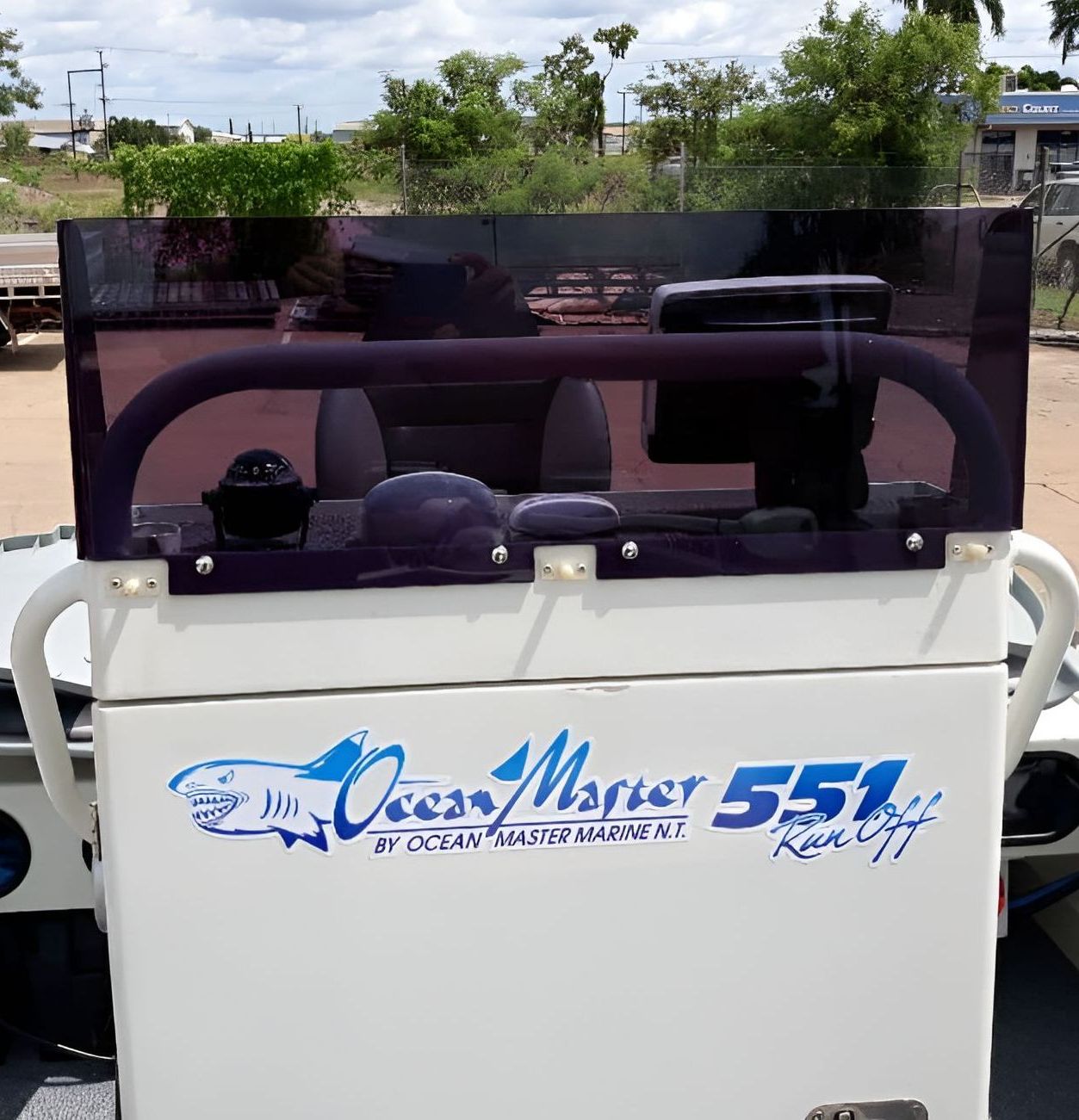 A White Boat With The Word Captain On The Back — Ram Star Plastics In Winnellie, NT
