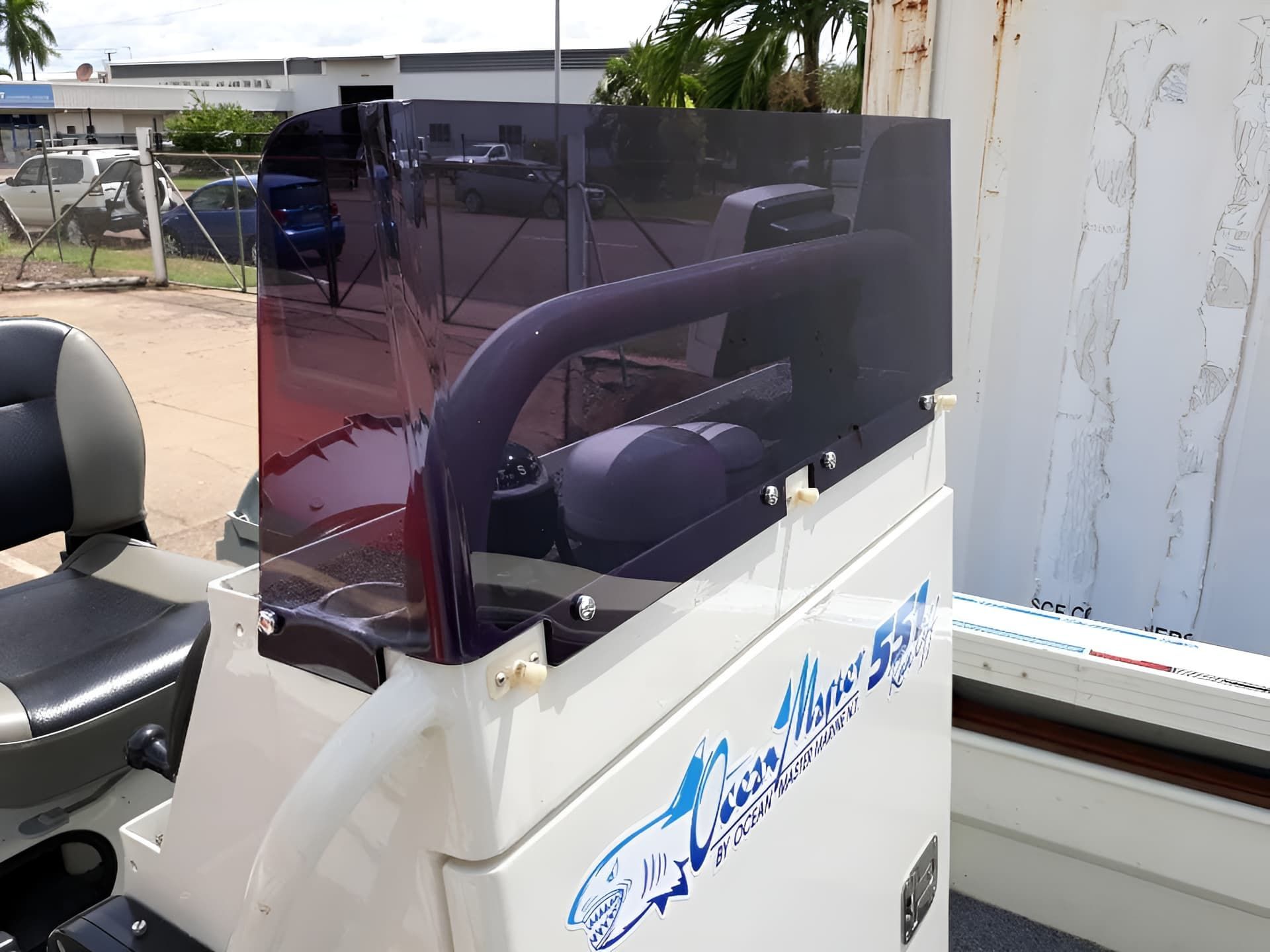 A White Boat With A Blue Windshield — Ram Star Plastics In Winnellie, NT