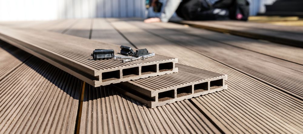 A Couple Of Pieces Of Wood Sitting On Top Of A Wooden Deck — Ram Star Plastics In Winnellie, NT