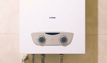 Water Heater Installation — Gas water Heater in the Bathroom  in Racine, WI