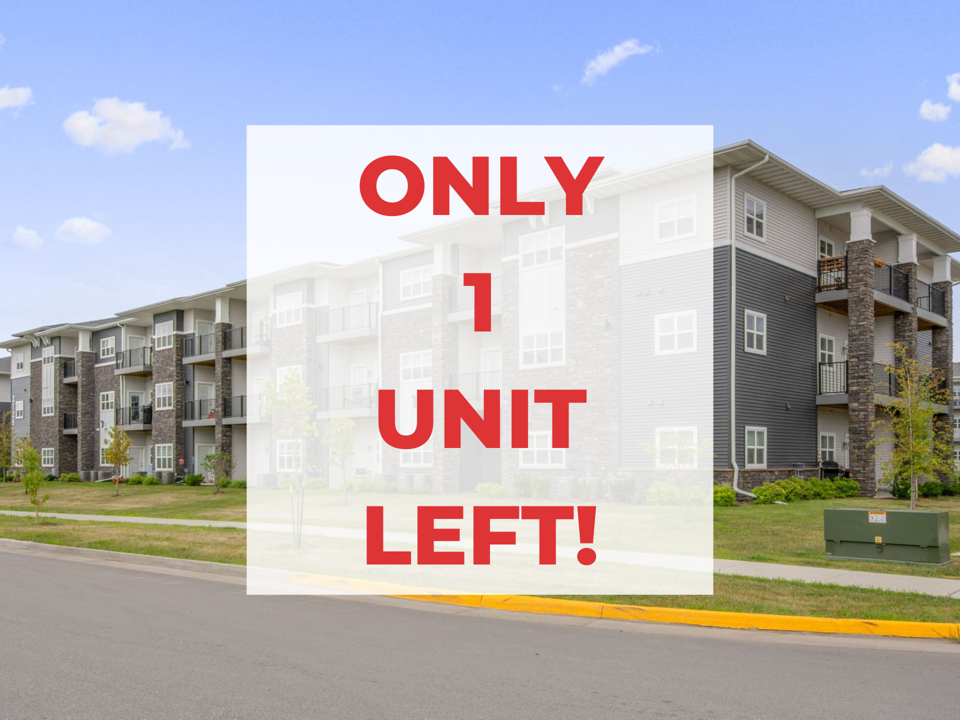 Exterior view of Aurora Heights, a modern apartment complex in Ames, IA offering convenient living spaces close to local & ISU amenities.