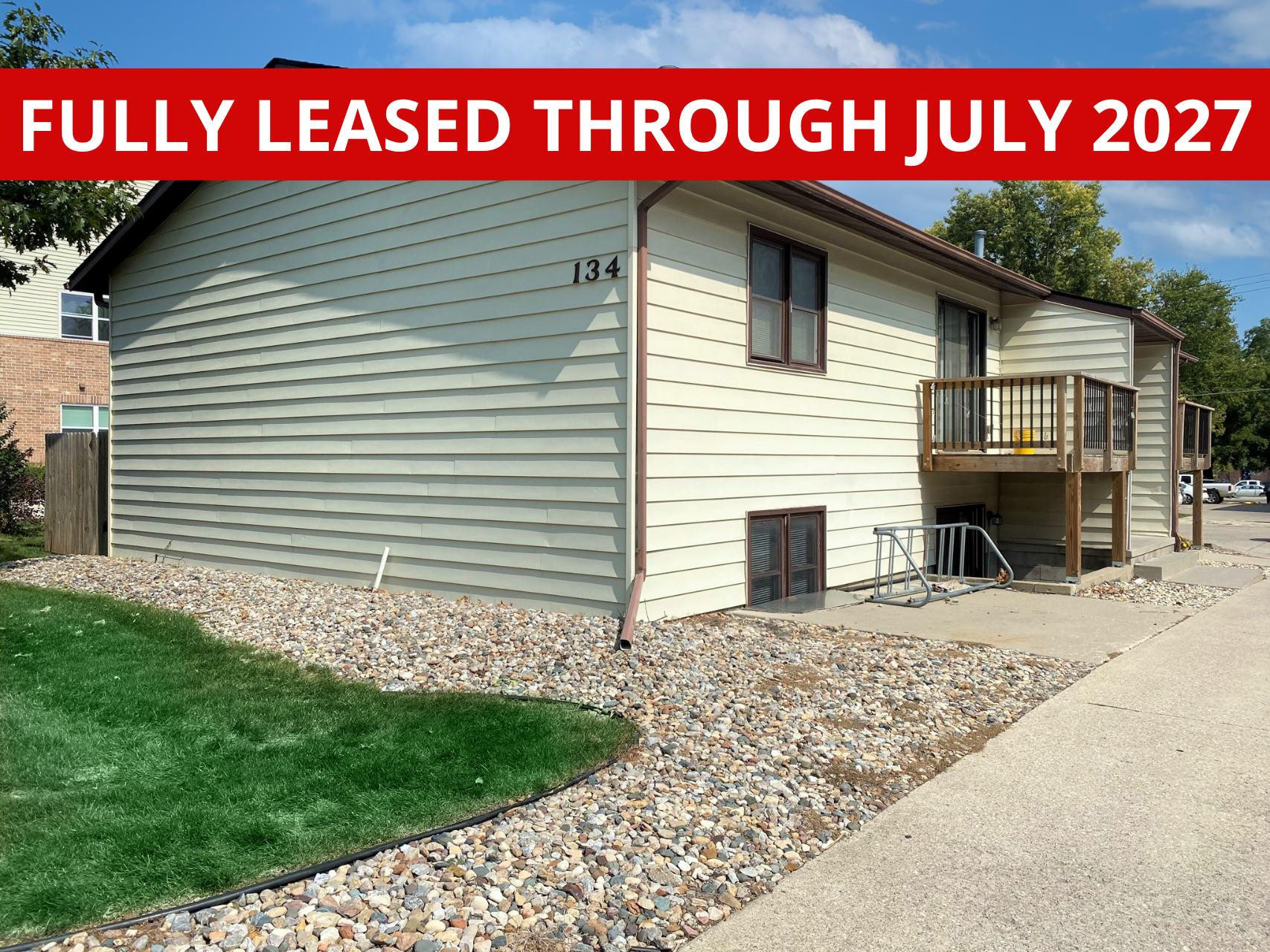 Exterior view of 134 Hyland, a comfortable apartment building in Ames, IA offering convenient living spaces close to ISU amenities.