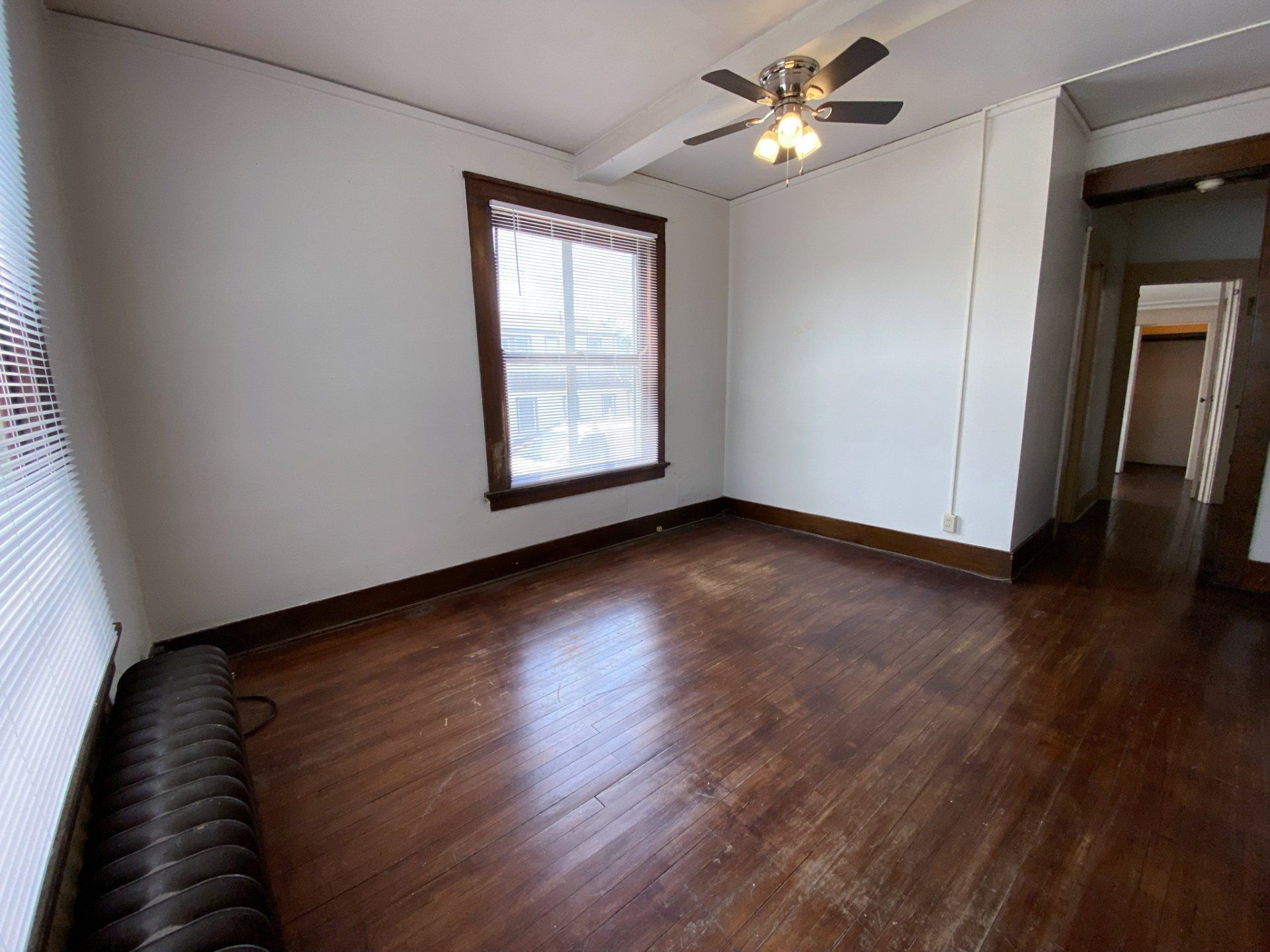 Interior view of a comfortable apartment unit at Unique Apartment Homes in Ames, IA, featuring spacious living areas and contemporary finishes