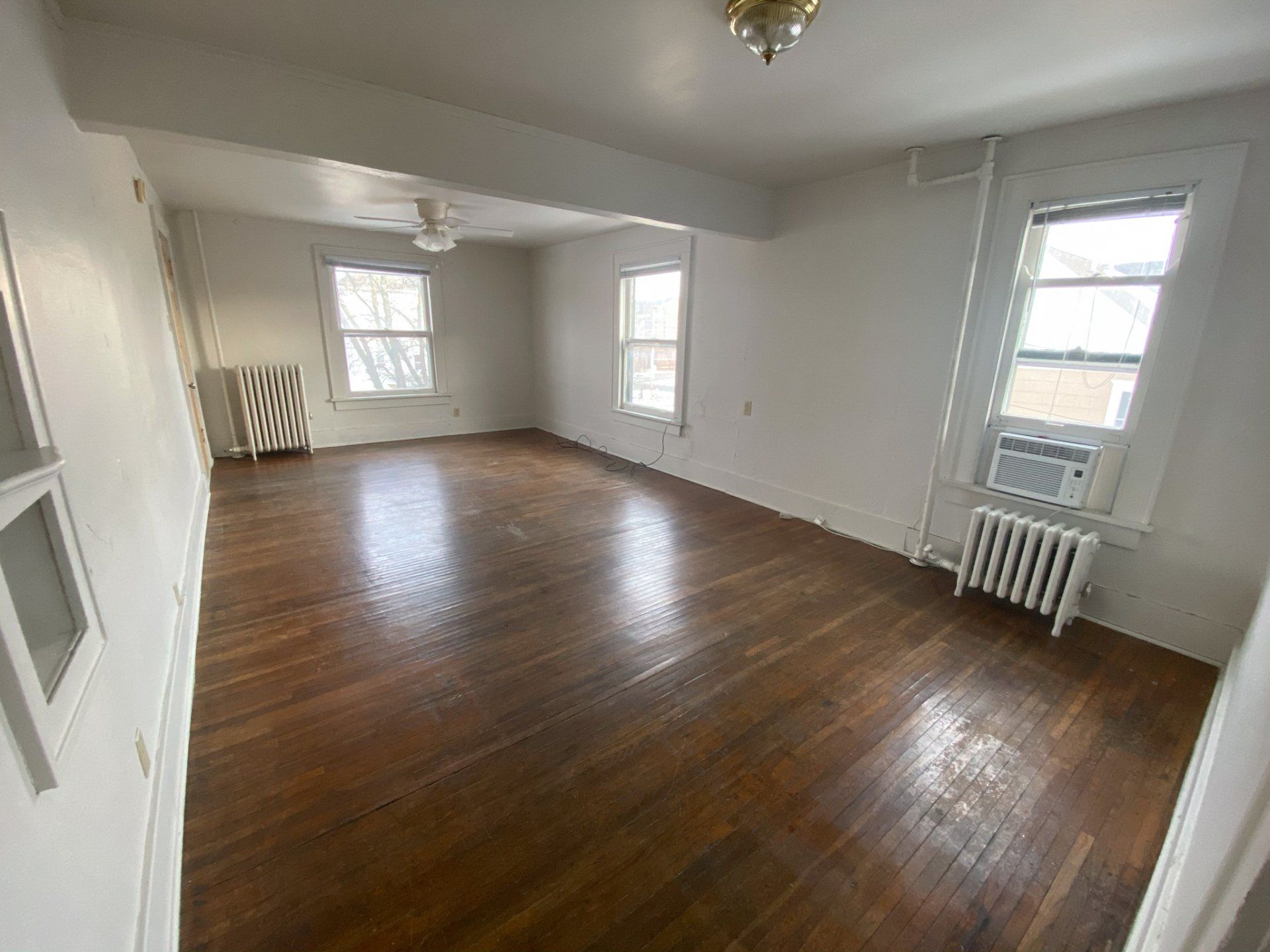 Interior view of a comfortable apartment unit at Unique Apartment Homes in Ames, IA, featuring spacious living areas and functional finishes