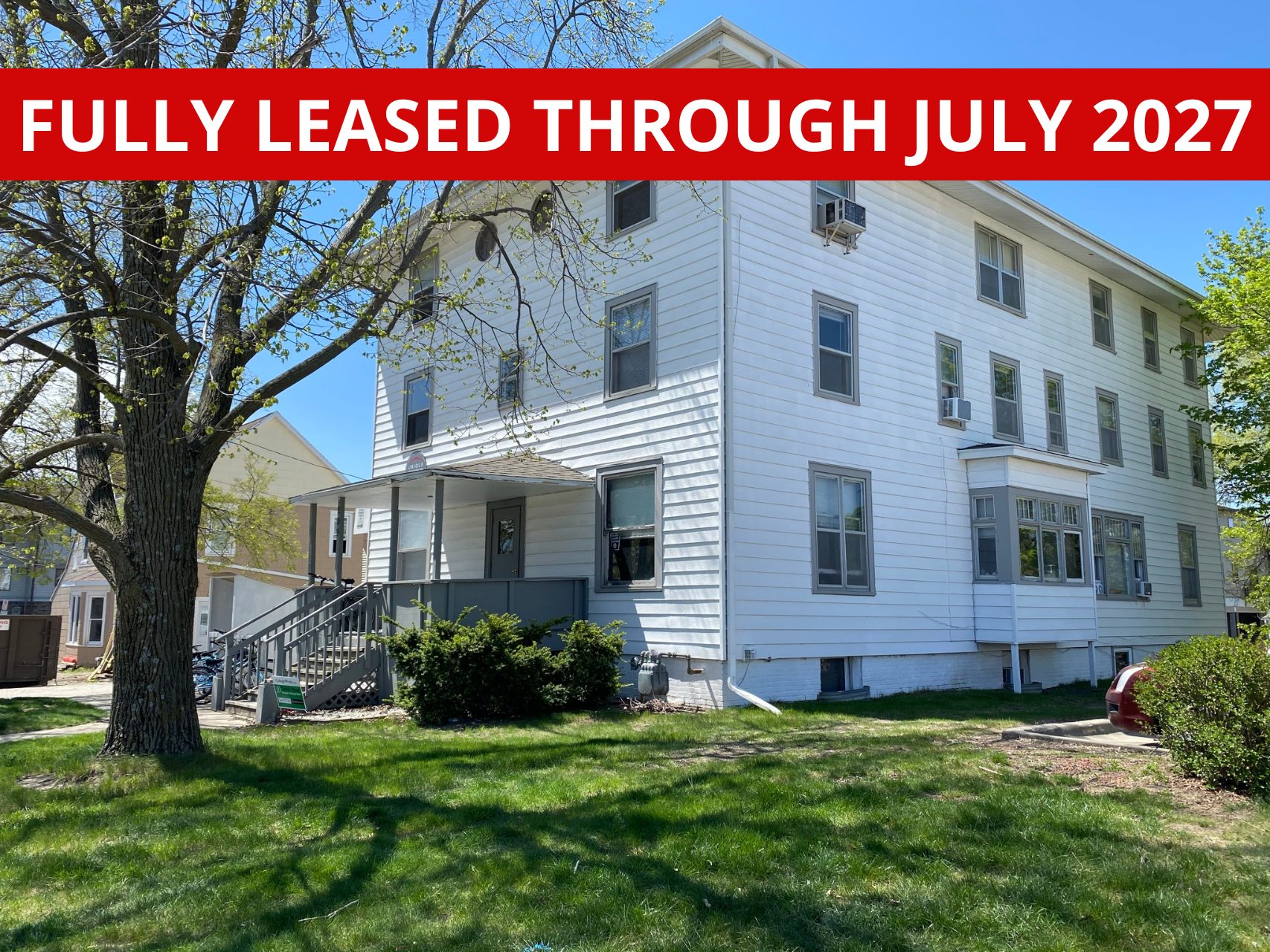 Exterior view of 209 Hyland, a comfortable apartment building in Ames, IA offering convenient living spaces close to ISU amenities.