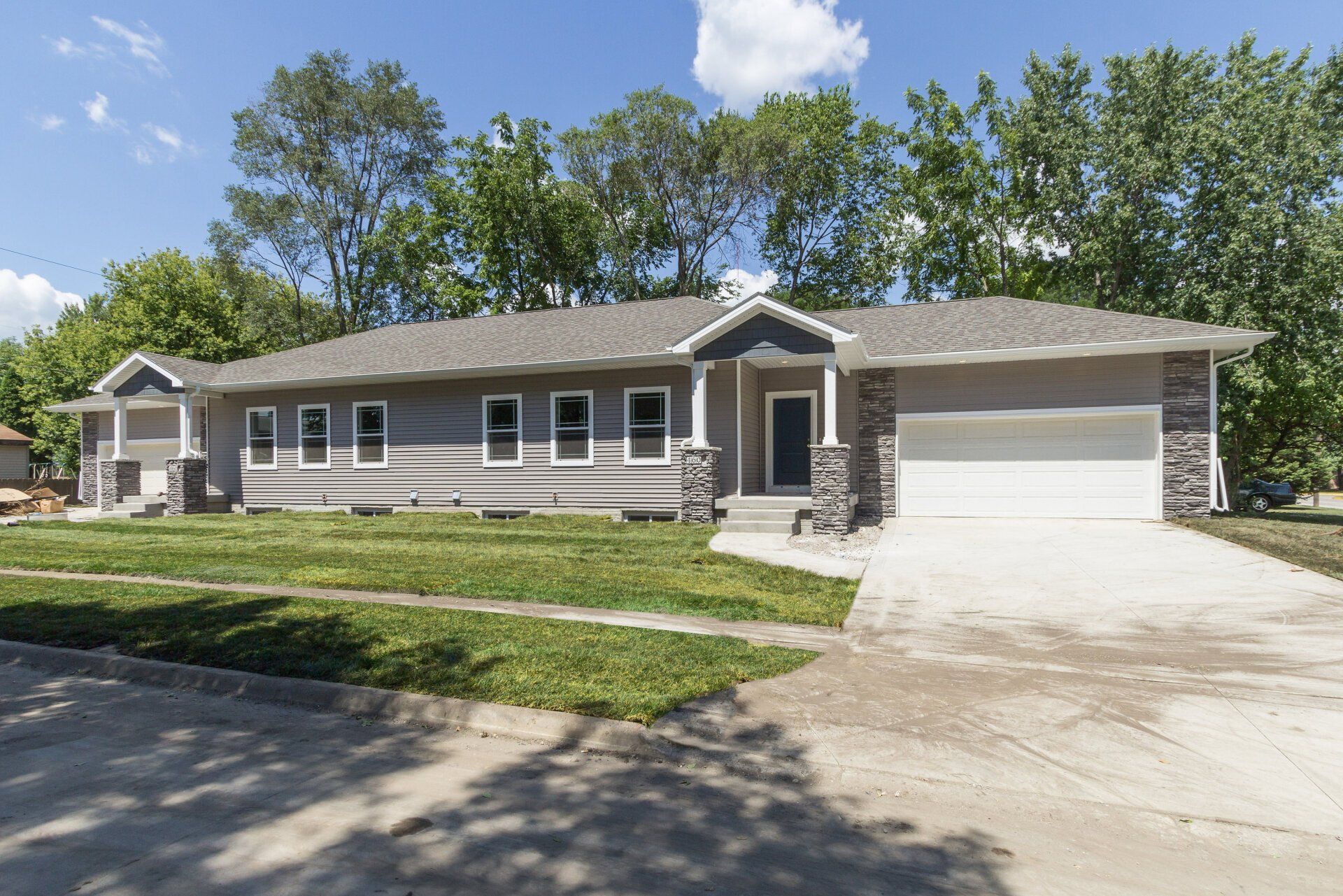 Exterior view of Hutchison duplex, a modern duplex in Ames, IA offering convenient living spaces close to local amenities.