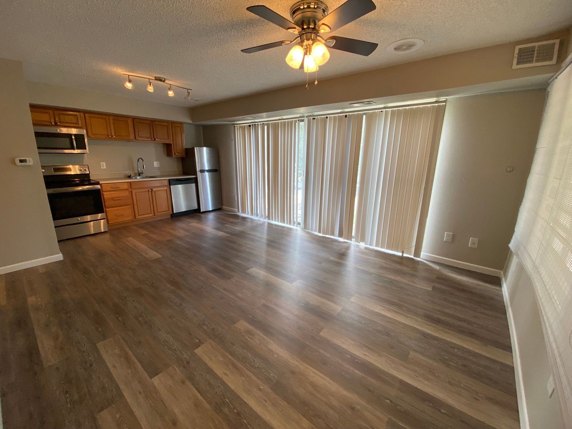 Interior view of a modern apartment unit at Unique Apartment Homes in Ames, IA, featuring spacious living areas and contemporary finishes