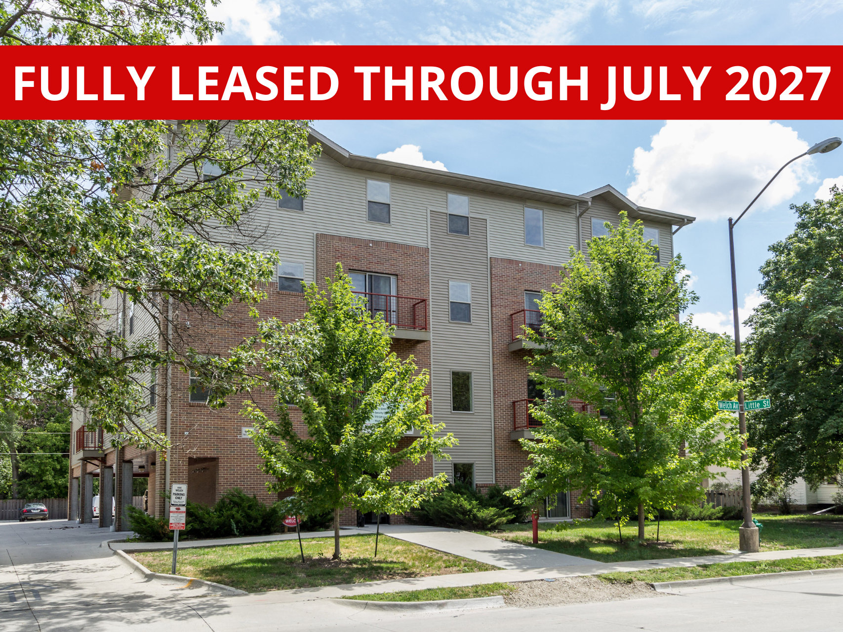 Exterior view of 444 Welch, a modern apartment building in Ames, IA offering convenient living spaces close to ISU amenities.