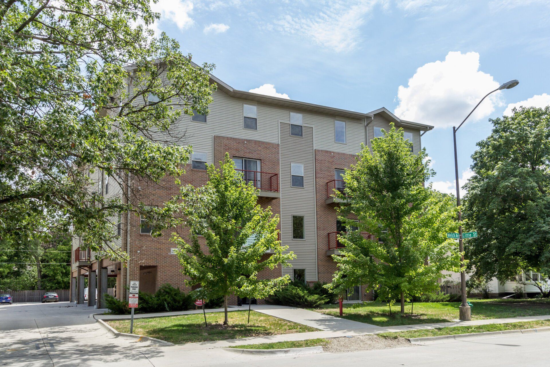 Exterior view of 444 Welch, a modern apartment building in Ames, IA offering convenient living spaces close to ISU amenities.