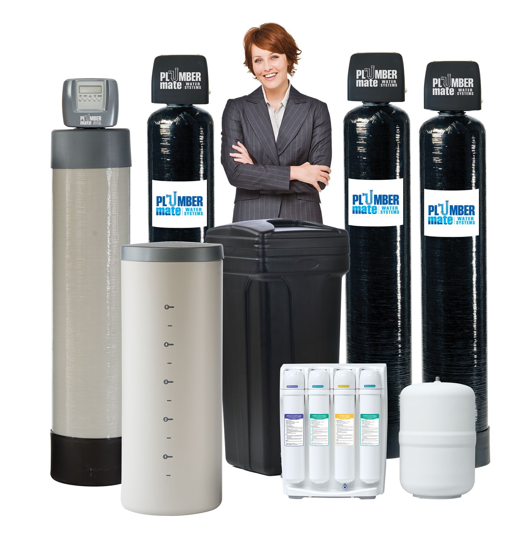Woman standing behind water filtration and softener systems.