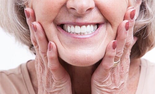 Senior Woman with Dentures—Cosmetic Dentistry in Moorpark, CA