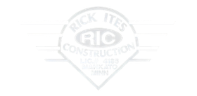 A white logo for rick ites construction on a white background.