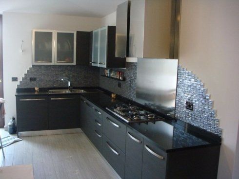 cucina in legno e acciaio