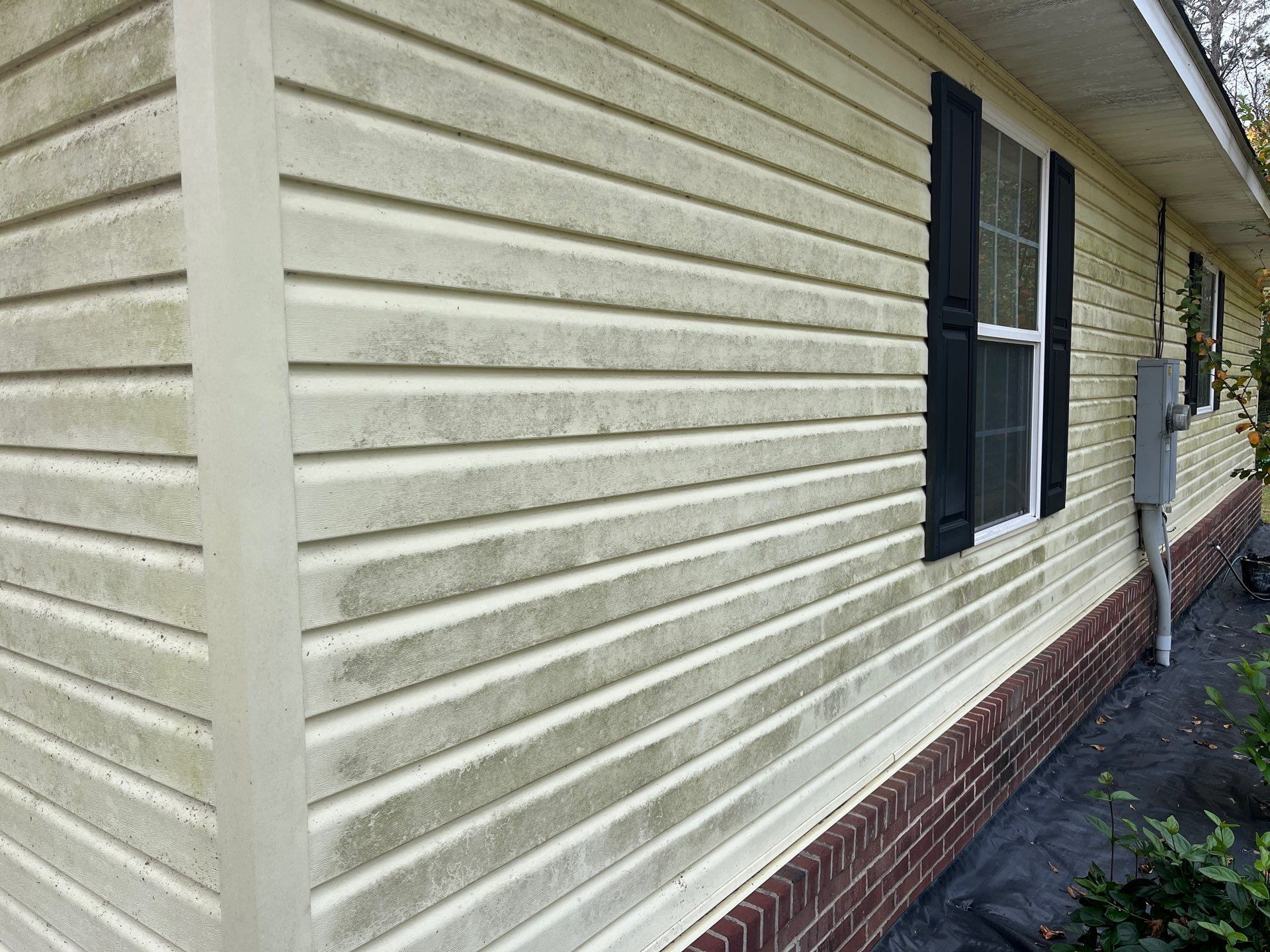 the side of a house has a lot of stains on it