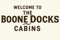 Welcome sign for Boone Docks Cabins. Brown text on a light beige background.