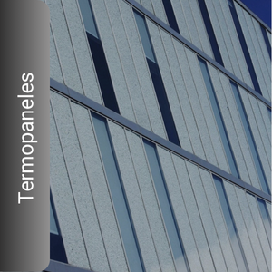 Un edificio con un cartel que dice termopaneles.