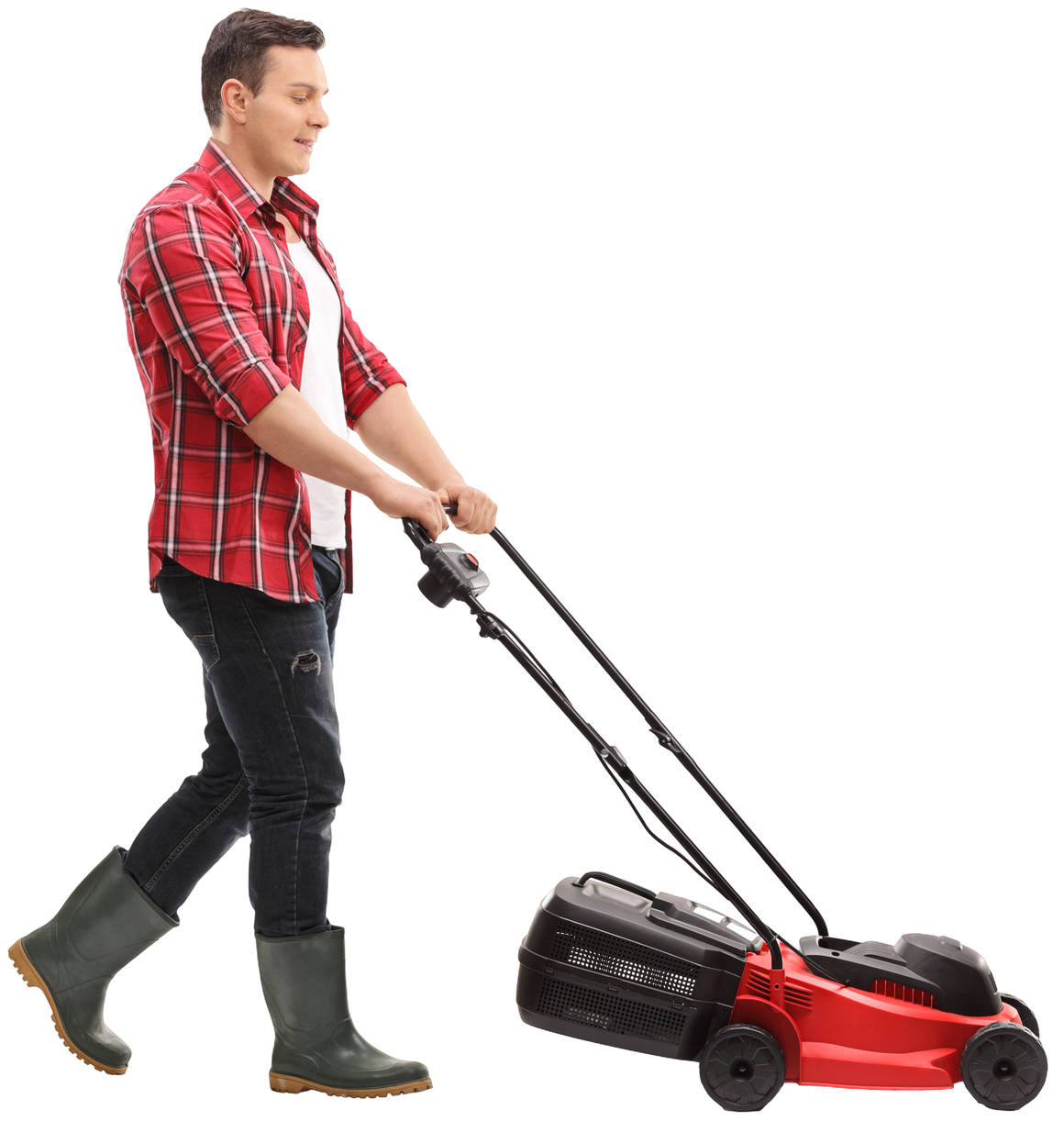 Man mowing grass with a lawnmower in a yard with green bushes and trees.