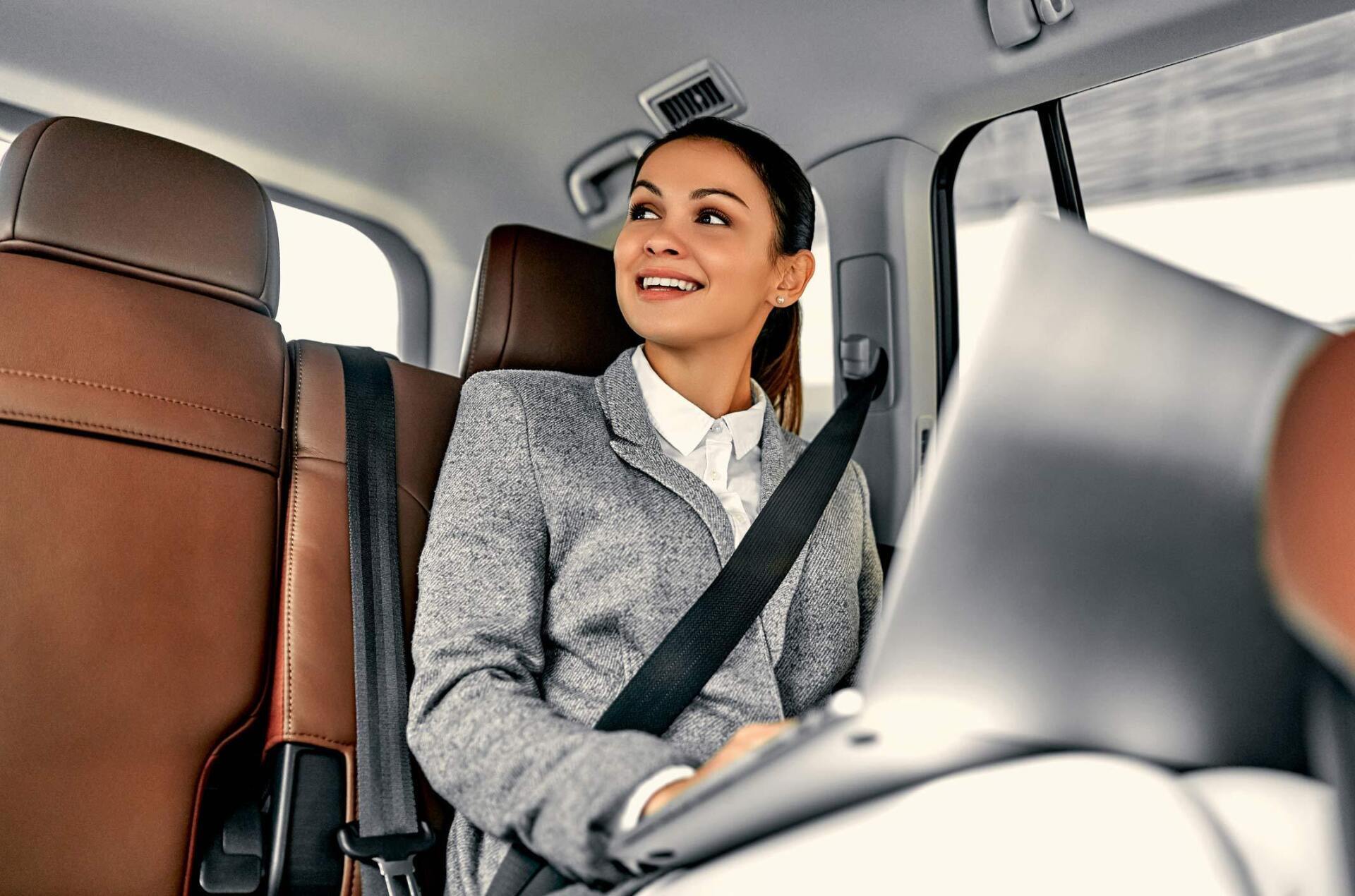 Formal Attire Of the Woman Smiling — East Meadows, NY — AES Luxury Transportation LLC