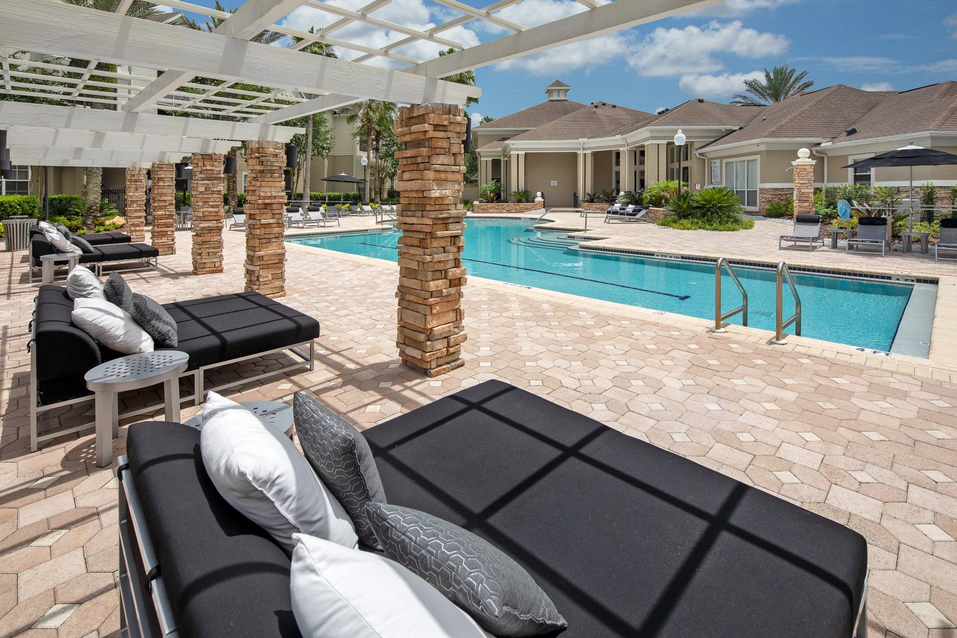 Eddison at Deerwood Park | Swimming Pool with Poolside Lounge and Sofa