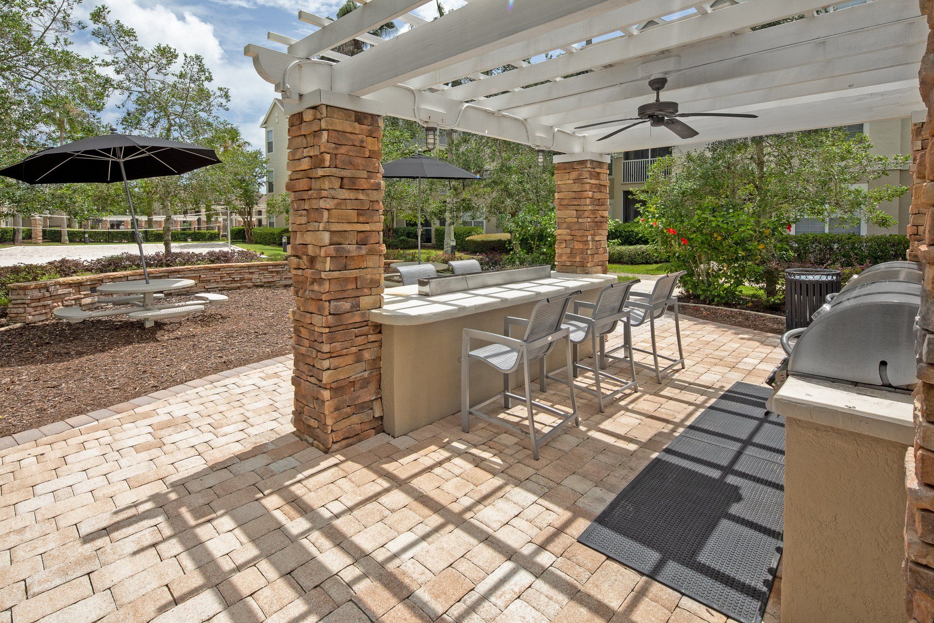 Eddison at Deerwood Park | Apartment Outdoor Grill