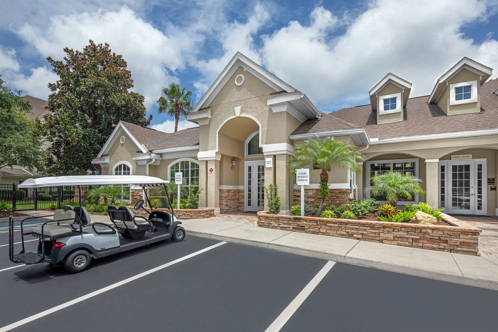 Eddison at Deerwood Park | Leasing Building with Golf Cart Parking in the front